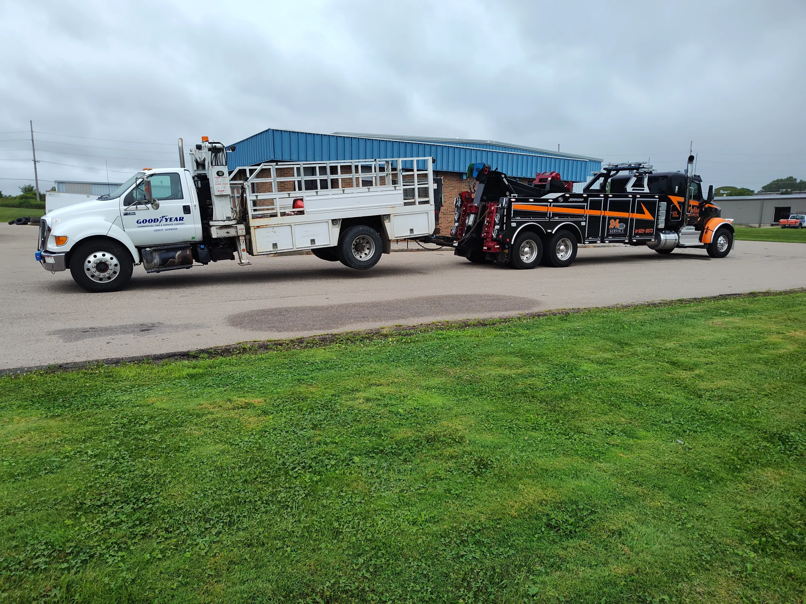 Zielke heavy-duty wrecker towing Goodyear service truck in Benton Harbor, MI