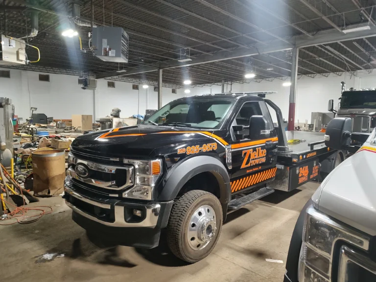 Zielke Towing Ford tow truck parked indoors ready for fuel delivery service in Benton Harbor, Michigan