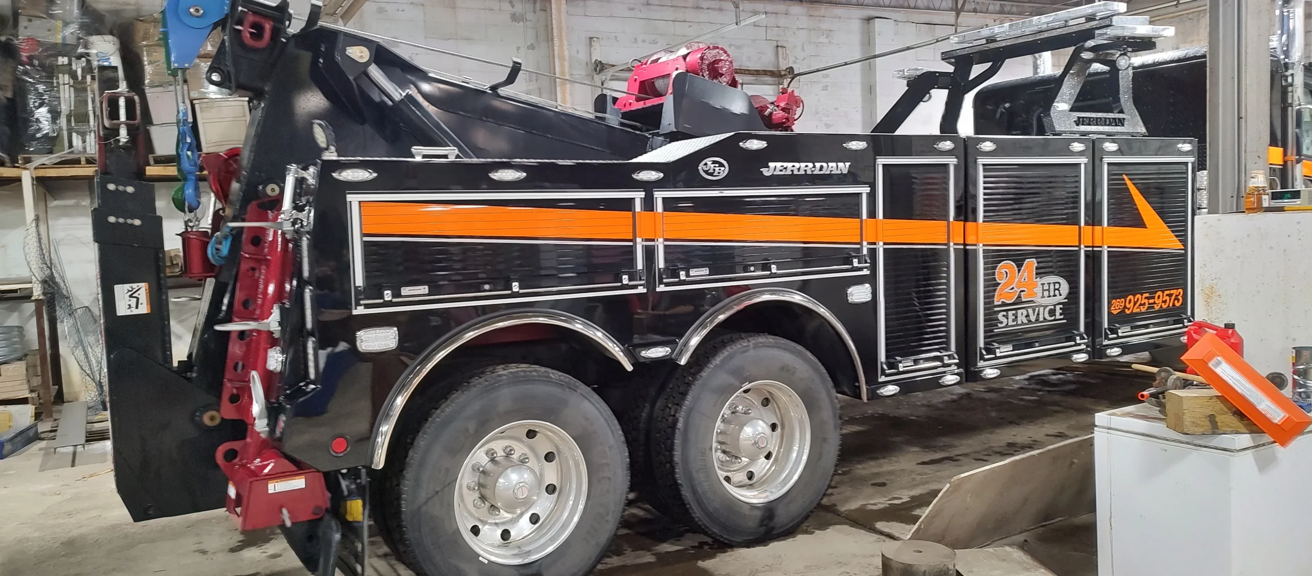 Zielke heavy-duty tow truck equipped with fuel tools for roadside gas delivery and towing in Michigan