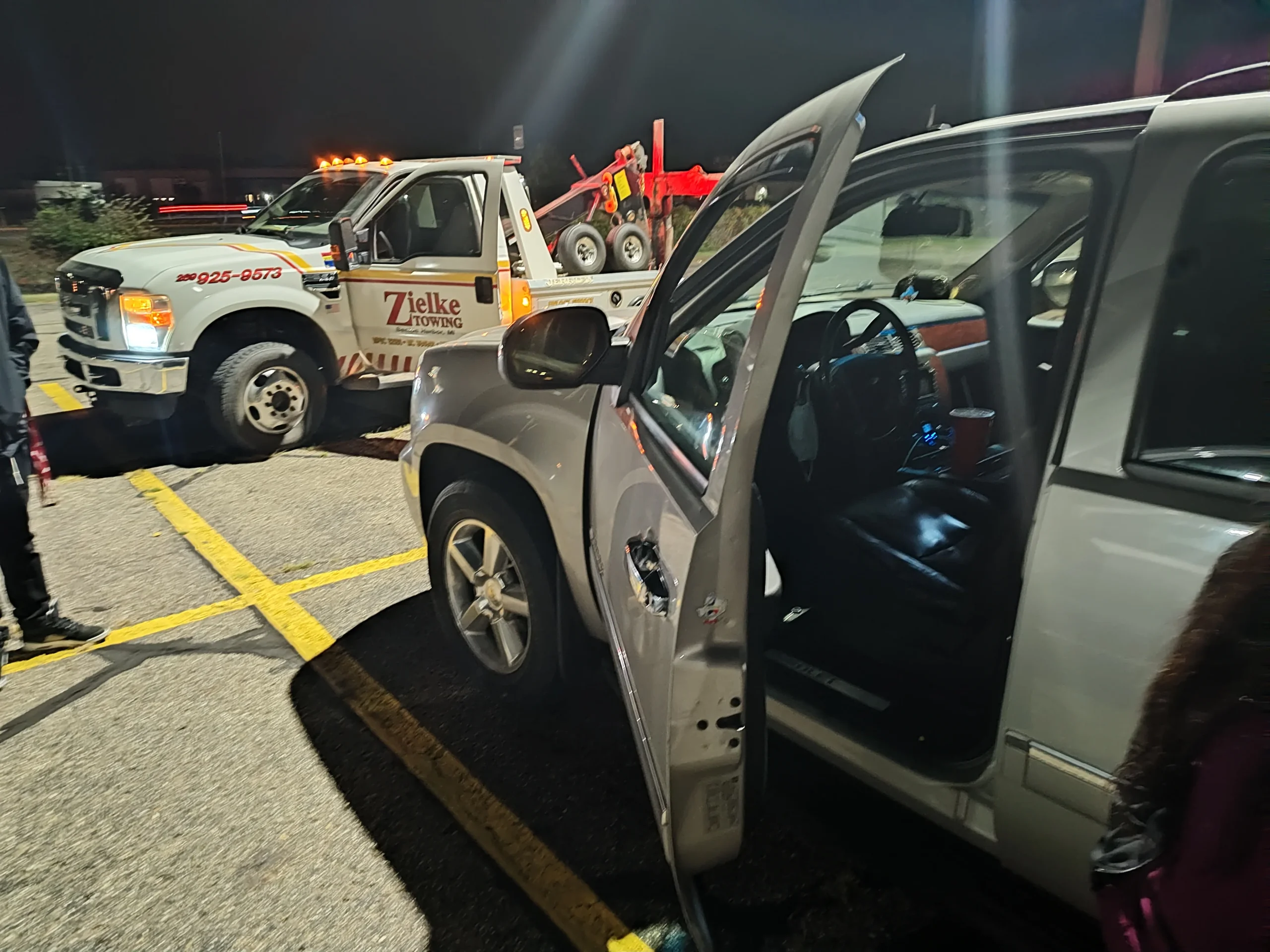 Nighttime roadside assistance by Zielke Towing after a drivetrain issue left a vehicle stranded in a parking lot