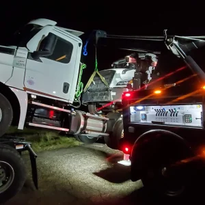 Zielke Towing & Tire service truck parked roadside, ready to assist stranded vehicle in Southwest Michigan